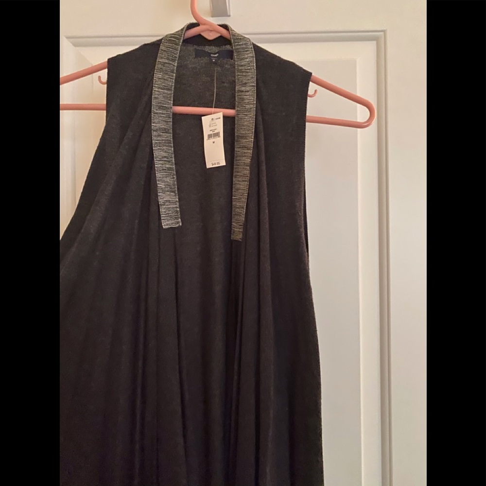 Gap long sleeveless vest w/sparkles at collar.